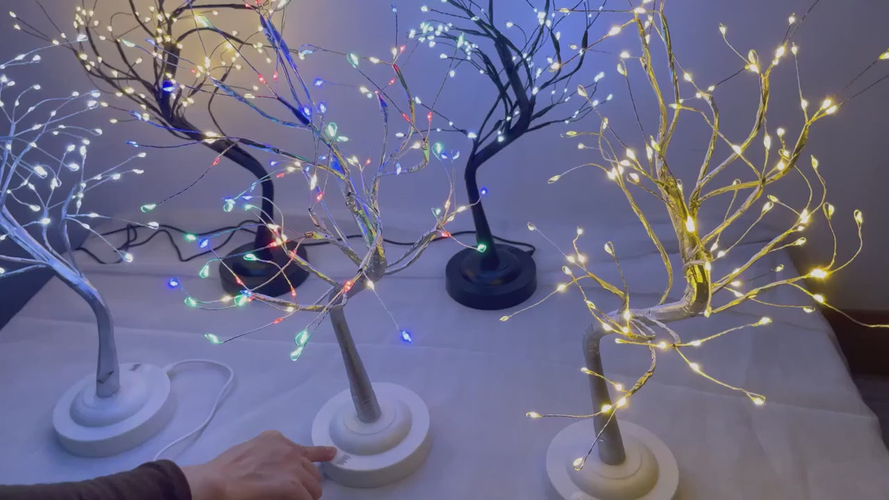 Load video: LED tree night ight with golen glowing branches.